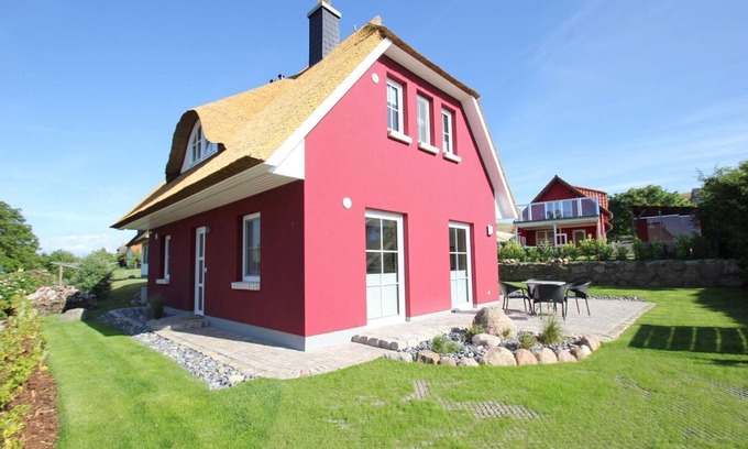 Gager House | Vacation home Falke - chic vacation home with sea view, terrace and fireplace -