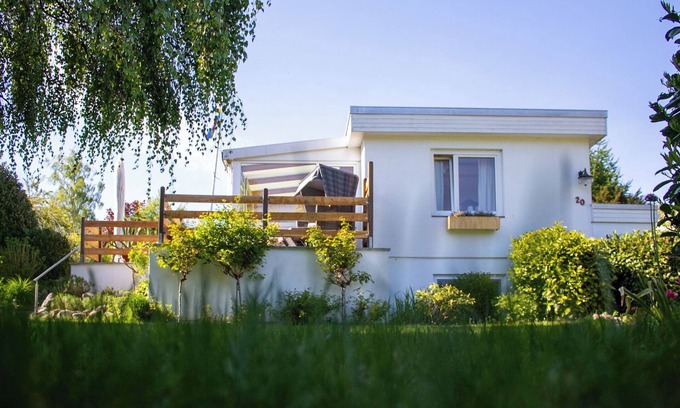 Ponitz am See House | Vacation home "Kleine Freiheit" at the bathing lake in Scharbeutz - Vacation at the Baltic Sea