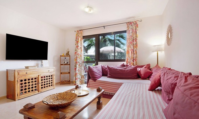 Corralejo House | Vacation Home "Oasis Tamarindo Sport E Relax" with Shared Pool, Private Terraces & Wi-Fi