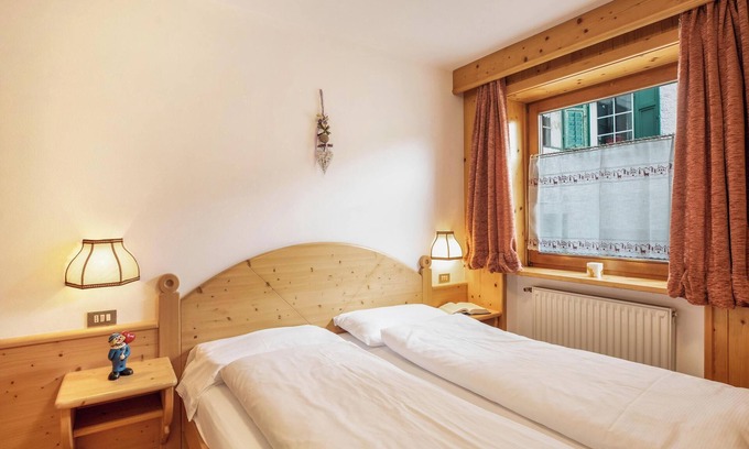 San Giovanni di Fassa Apartment | Vacation Apartment "Ciasa Lino Rotic" with Mountain View & Wi-Fi