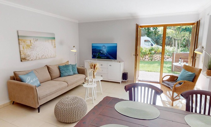 Pelzerhaken Apartment | Vacation oasis close to the beach with sun terrace on the Baltic Sea, for up to 4 people.