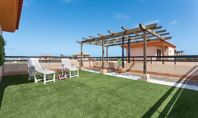 La Oliva Apartment | Vacation 'Punta Calma' with Sea View, Shared Pool and Wi-Fi