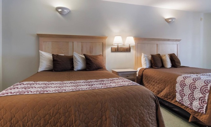 Bellaire Hotel | Vacation Wonderland Awaits at Summit Village - Cozy Guestroom at Shanty Creek!