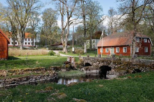 Knatte House | Vandrarhemmet Årås Säteri och Trädgårdar