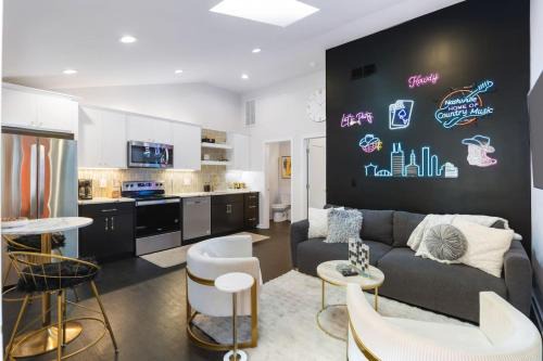 Greenwood Apartment | Vibrant Neon Condo Near Restaurants, Coffee and Bars