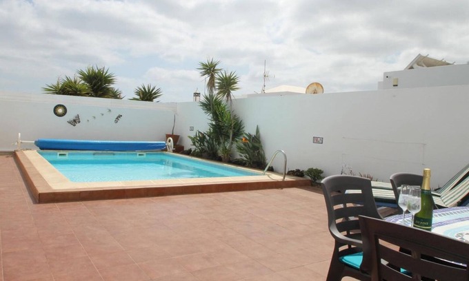 Costa Teguise Villa | Villa Beatrice, private heated pool, short walk to beach, shops & restaurants