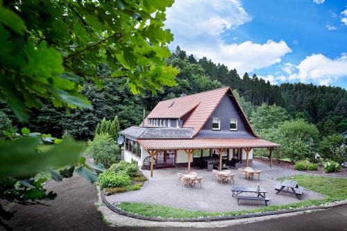 Schutzbach House | Villa für 10 Personen im Westerwald mit Kino, Bar, Sauna und Whirlpool