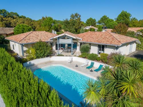 Biscarrosse Villa | Villa familiale avec piscine chauffée, clim, 4 chambres, proche golf et plages - FR-1-319-565