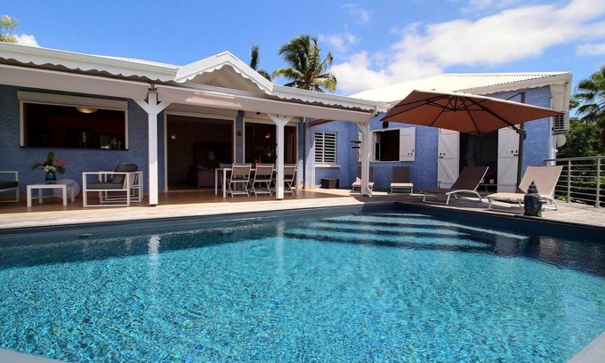 Sainte-Anne Villa | Villa Tillandsia, 3 bedrooms, 2 bathrooms, swimming pool, sea view, 5 minutes' walk from the beach.