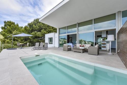 El Portet Villa | Villas Guzman - Eltrece