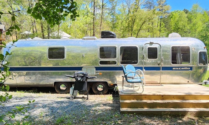 Mill Spring House | Vintage camper near the creek, short walk to pool and playground, gas grill, sleeps 5.