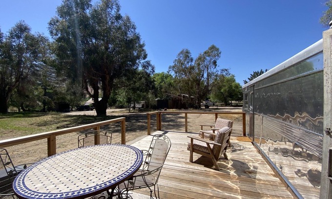 Kernville House | Vintage wood paneled travel trailer on Kernville Ranch with horses and hot tub