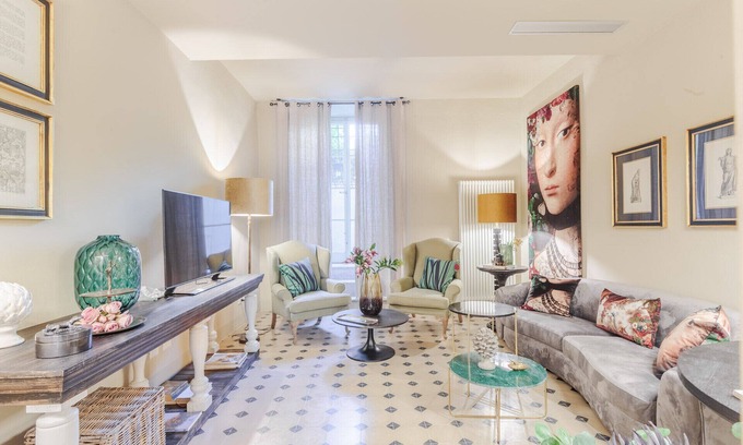 Lucca Historical Center Apartment | Vissi D'Arte, a Luxury Ground Floor Apartment with Private Garden inside the Walls of Lucca