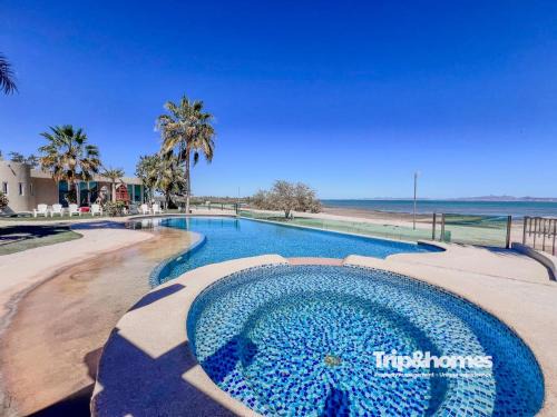 El Centenario Apartment | Vista Dorada 1BR condo Great view of Bay & Sea w pool
