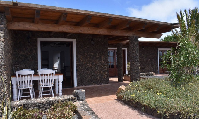 Haria House | Volcanic lava stone house short walk to the beach, sea and mountain views