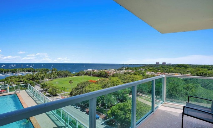Coconut Grove Apartment | Wake by the Waves. Drift into Calm. Large Balcony