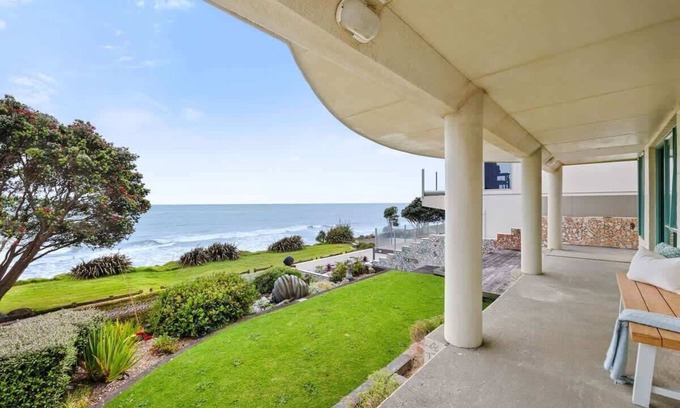 Bell Block Apartment | Wanaka Studio - sea views from your private patio