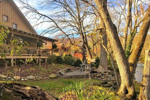 Bryson City House | Water's Edge ~ Covered Porch w/Deep Creek as your Backyard Haven