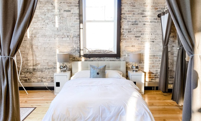 Petoskey Condo | Water View Loft in downtown Petoskey with reserved parking for two cars