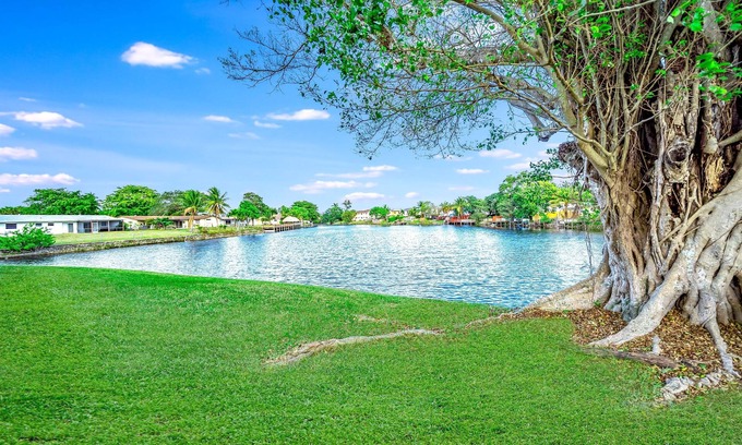 Survey Creek Apartment | Water View - Stocked - Palm Wave Says