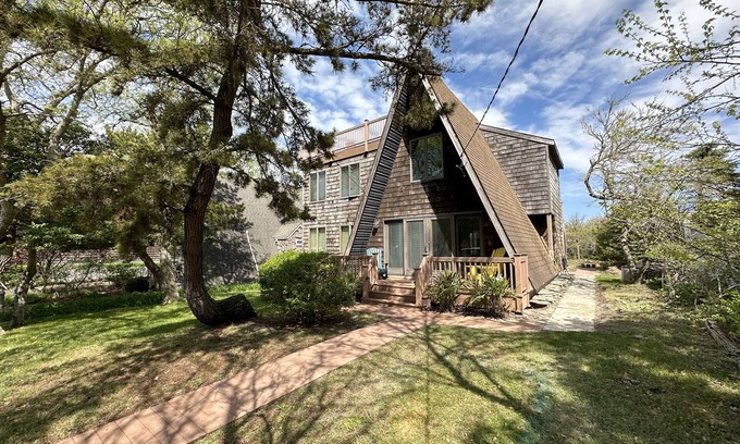 Cape May Point House | Water views and beach block. Watch sunset on your deck after a day at the beach.
