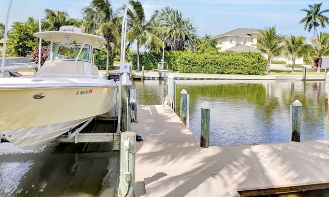 Jupiter House | Waterfront 4bedroom home with boat lift and additional 40' slip at extra cost