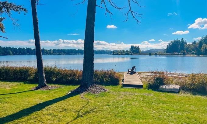 Erlands Point-Kitsap Lake House | Waterfront home with beach access, firepit, fireplace, water views, grill, dock