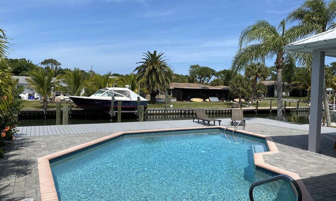 Silver Shores House | Waterfront Island Pool Home, Walk to Beach, dock your boat includes boat lift