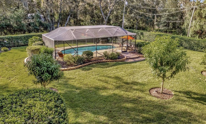 Temple Terrace House | Waterfront, oasis, family retreat, 5 minutes from theme park,