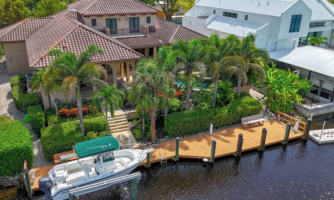 Aqualane Shores House | Waterfront Paradise in Aqualane Shores | 4BR Estate with Pool & Dock
