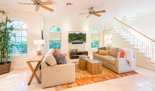 Captiva House | Waterfront Pink House with Private Dock & Pool