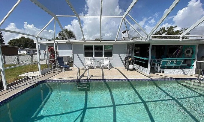Port Charlotte - Charlotte Harbor House | WATERFRONT/POOL HOME W/GULF BREEZES, TIKI BAR BOATS, LINAI, PETS OK, INCLUSIVE!