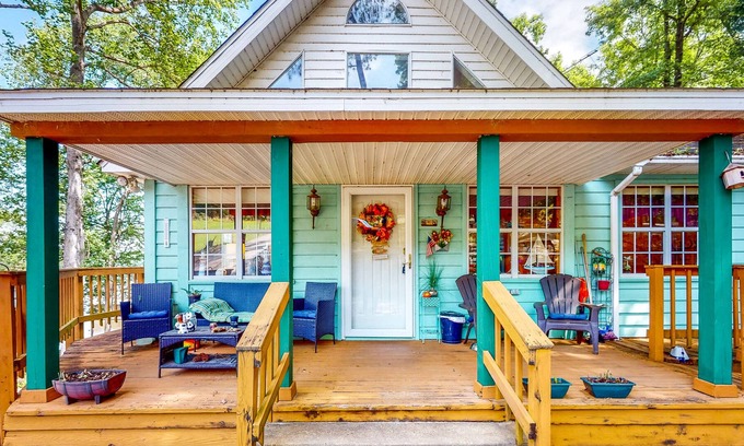 Fort Gaines House | Waterfront stay with boat launch, private beach, wrap-around deck, & grill