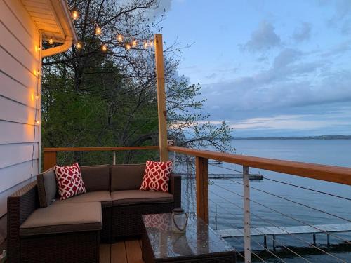 Geneva House | Waters Edge Lakefront with Kayaks Fire Pit and Dock