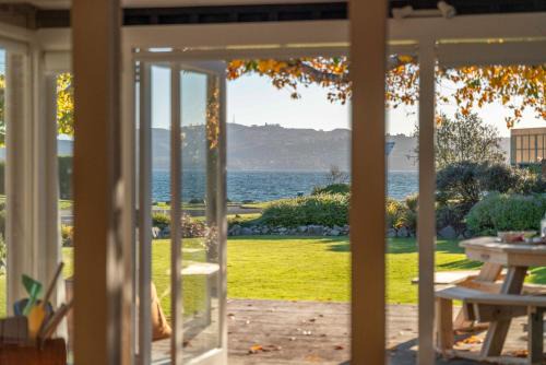 Rainbow Point House | Waterside Bliss - Taupo Holiday Home