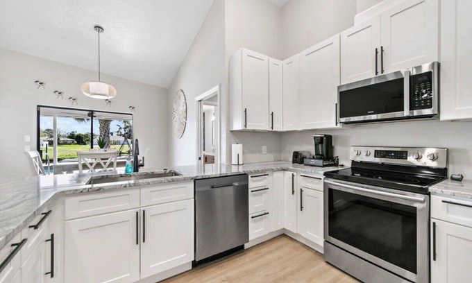 Pebble Beach House | Waterside Villa! Family Home! Pool! BBQ! Fishing