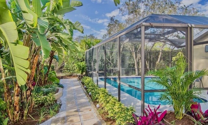 Florida Ridge House | Welcome to Casa Del Jardin. You very own private sanctuary with heated pool.