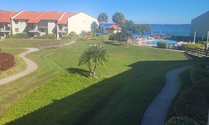 Tierra Verde Condo | Welcome to the island lifestyle with garden and pool views on Tierra Verde!