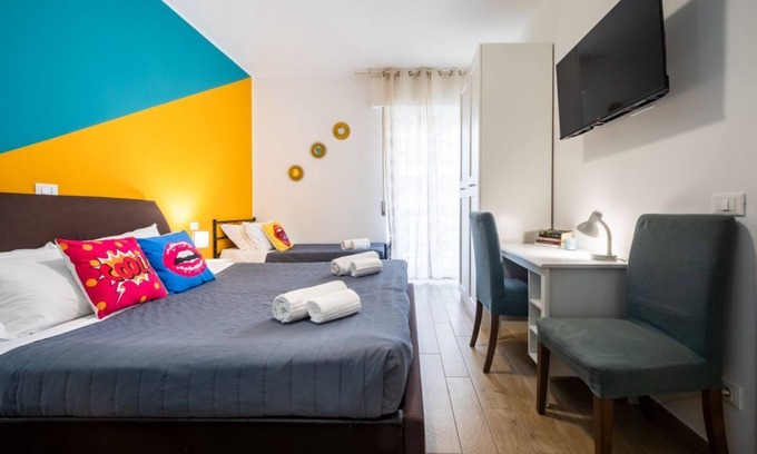 Borgo Milano Apartment | Welcome to Verona Pop, a comfortable duplex of approximately 90 m2, completely renovated in 2020, very bright and furnished with care and attention.The pop art style chosen for this house makes it lively and unique!The accommodation consists of two commu
