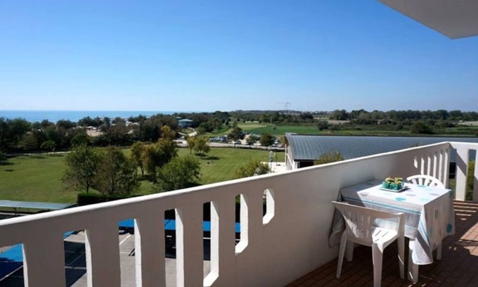 Porto Santa Margherita Apartment | Welcoming flat with large terrace
