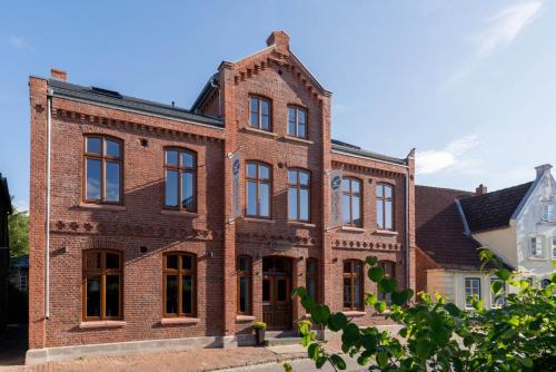 Tating Hotel | Wellenreiter