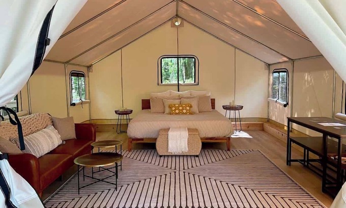 Zoe RV Rental | Whippoorwill's Nest - Glamping Tent with AC