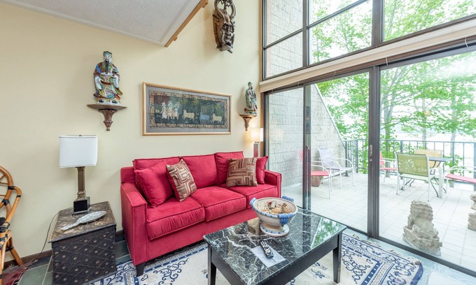 Thayerville Condo | Will O' The Wisp 307C: Lakefront One Bedroom Condo with Exotic Flair, Fireplace,
