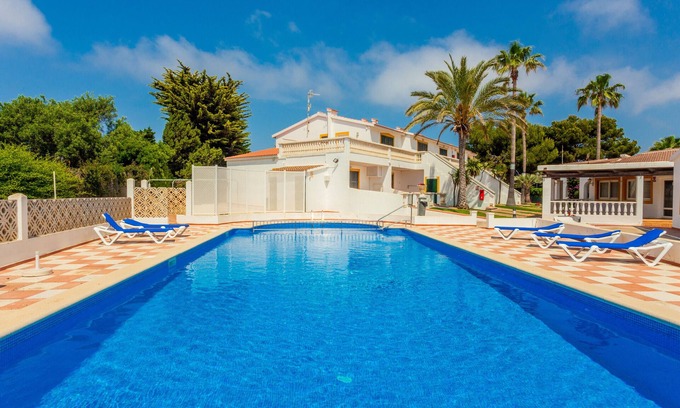 Cala'n Bosch Apartment | Wonderful Apartment with Terrace, Pool, and Wi-Fi