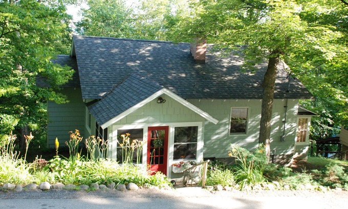 Saranac Lake House | Wooded Hilltop Retreat in Historic Saranac Lake