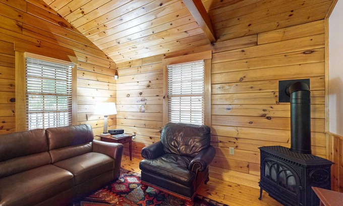 Northport Cabin | Wooded view cabin near hiking trails with kitchen & fireplace - dog-friendly