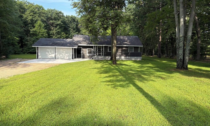 Lake City House | Year-round 3BR/2BA trailside house & 4 electric campsites near Lake Missaukee