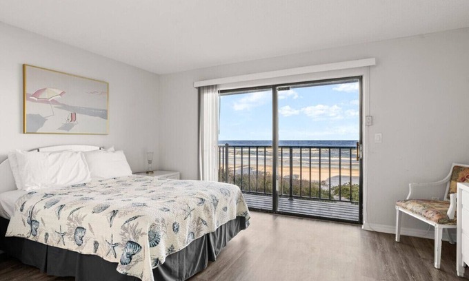 Southern Shores Villa | Yellow Sunshine Oceanfront Townhouse, Private Balcony