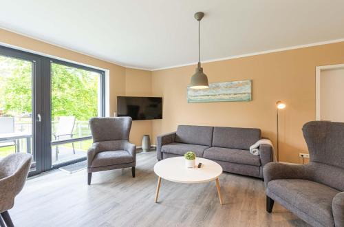 Krakow am See Apartment | Yogasutra - Stilvolles 3-Zimmer-Apartment mit Seeblick, Balkon & Sauna