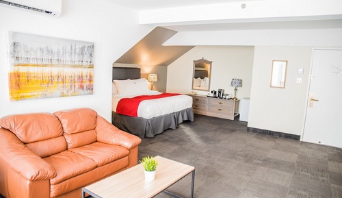 Suite, 1 King Bed, Partial River View